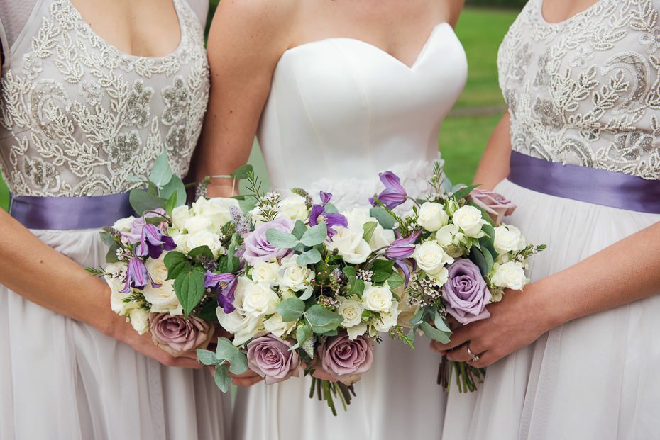Lilac and cream wedding theme flowers