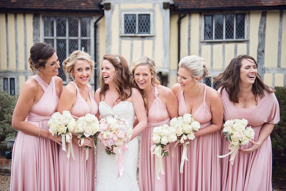 Relaxed and beautiful bridesmaids wearing Two Birds dresses