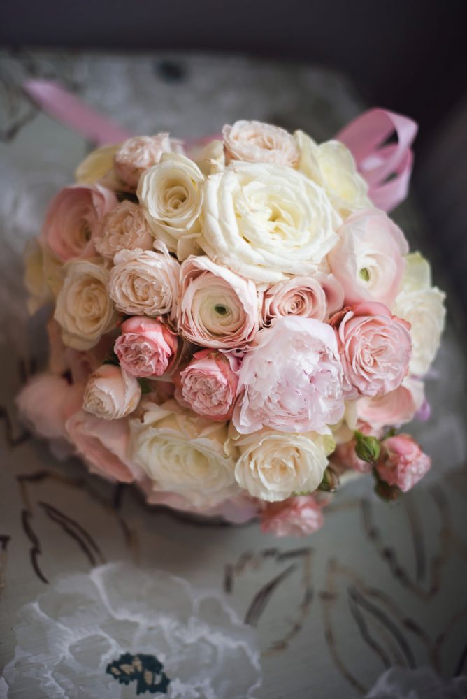 Pink and cream peony ranunculus and rose bouquet