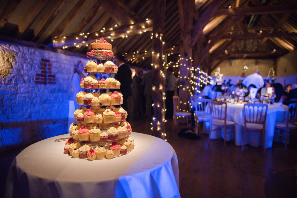 Wedding cake table at a barn wedding