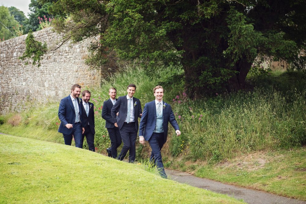 The grooms party arrive at church