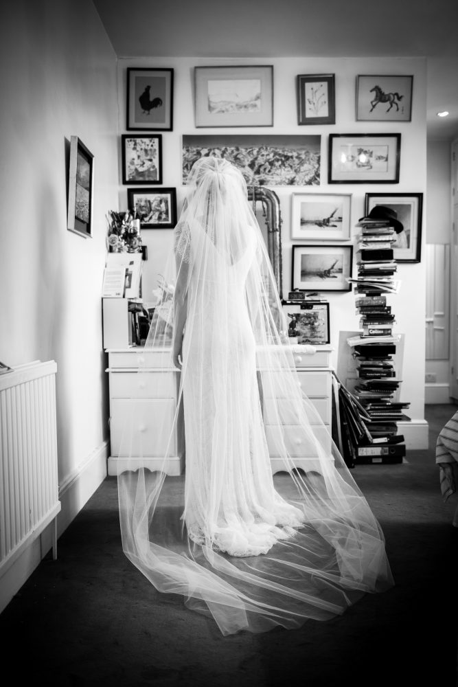 Beautiful elegant black and white wedding photo of a bride getting ready