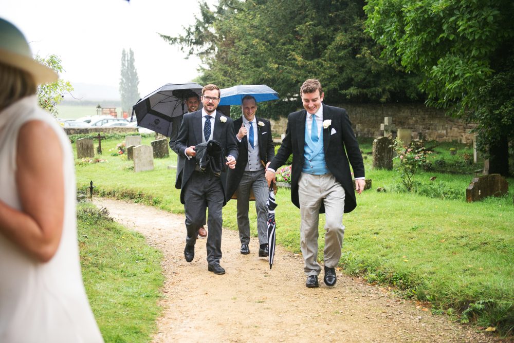 Wedding photographs in the rain.