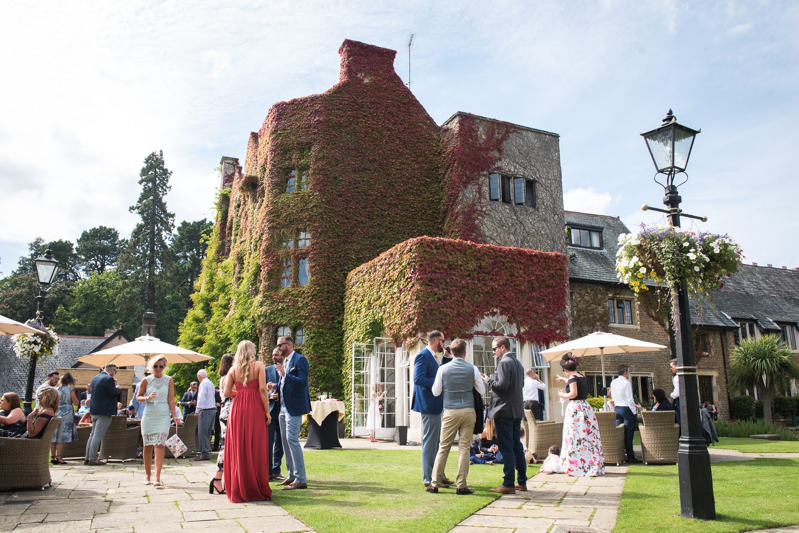 The outdoor terrace at Pennyhill park during a stylish Summer wedding.
