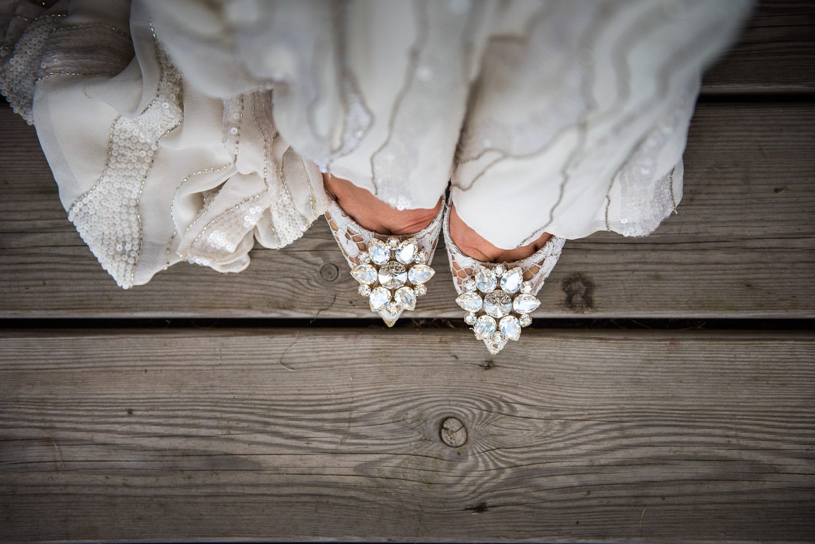 Glamorous lace and diamond bridal shoes teamed with a beaded Jenny Packham frock.