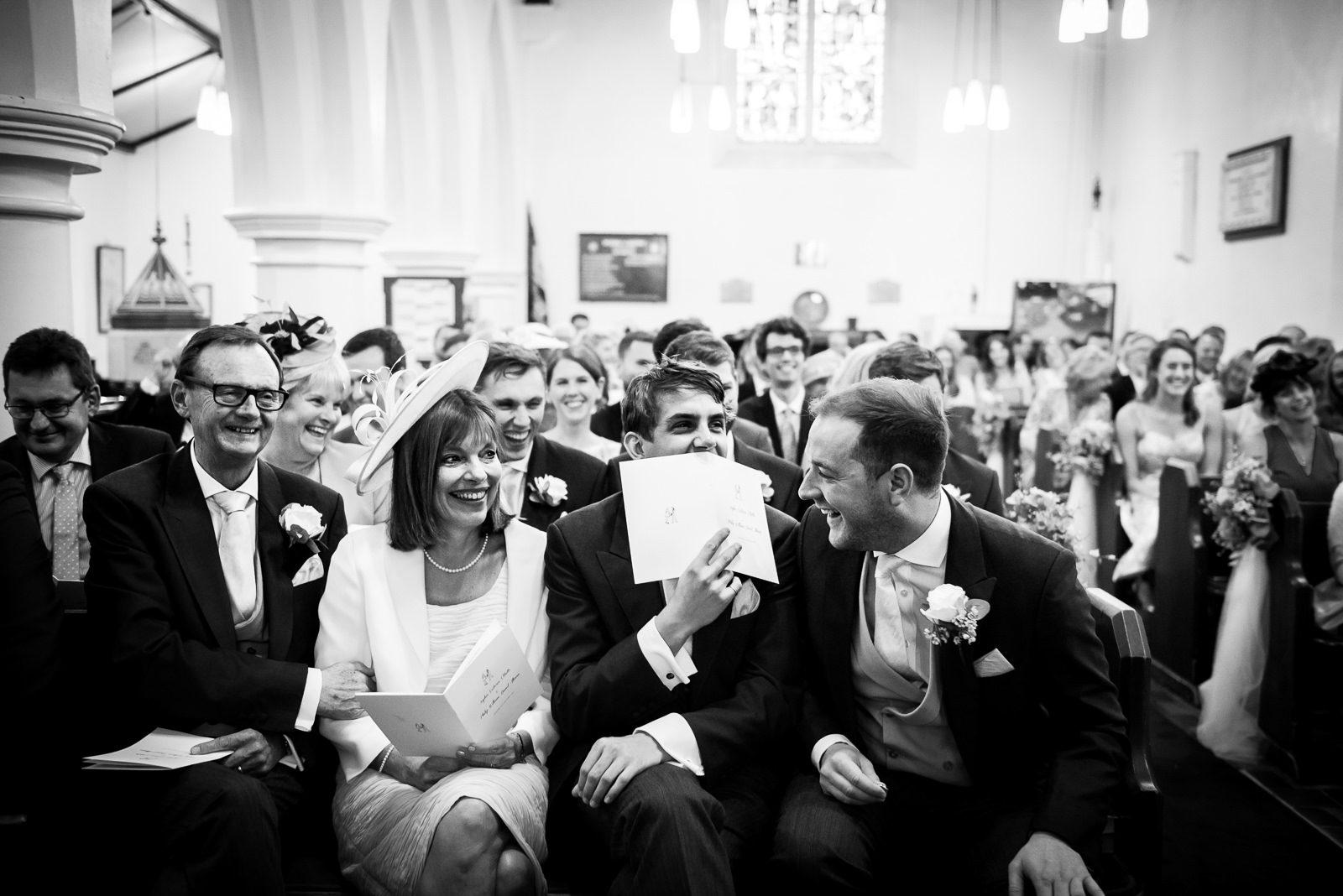 Classic black and white documentary wedding shot taken during the wedding ceremony.