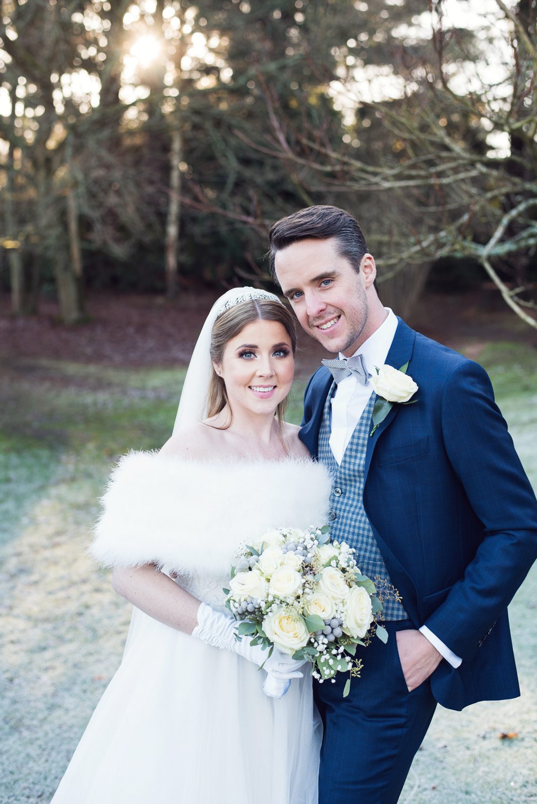 Winter bride and groom portraits at Pennyhill Park by Surrey wedding photographer Juliet Mckee.