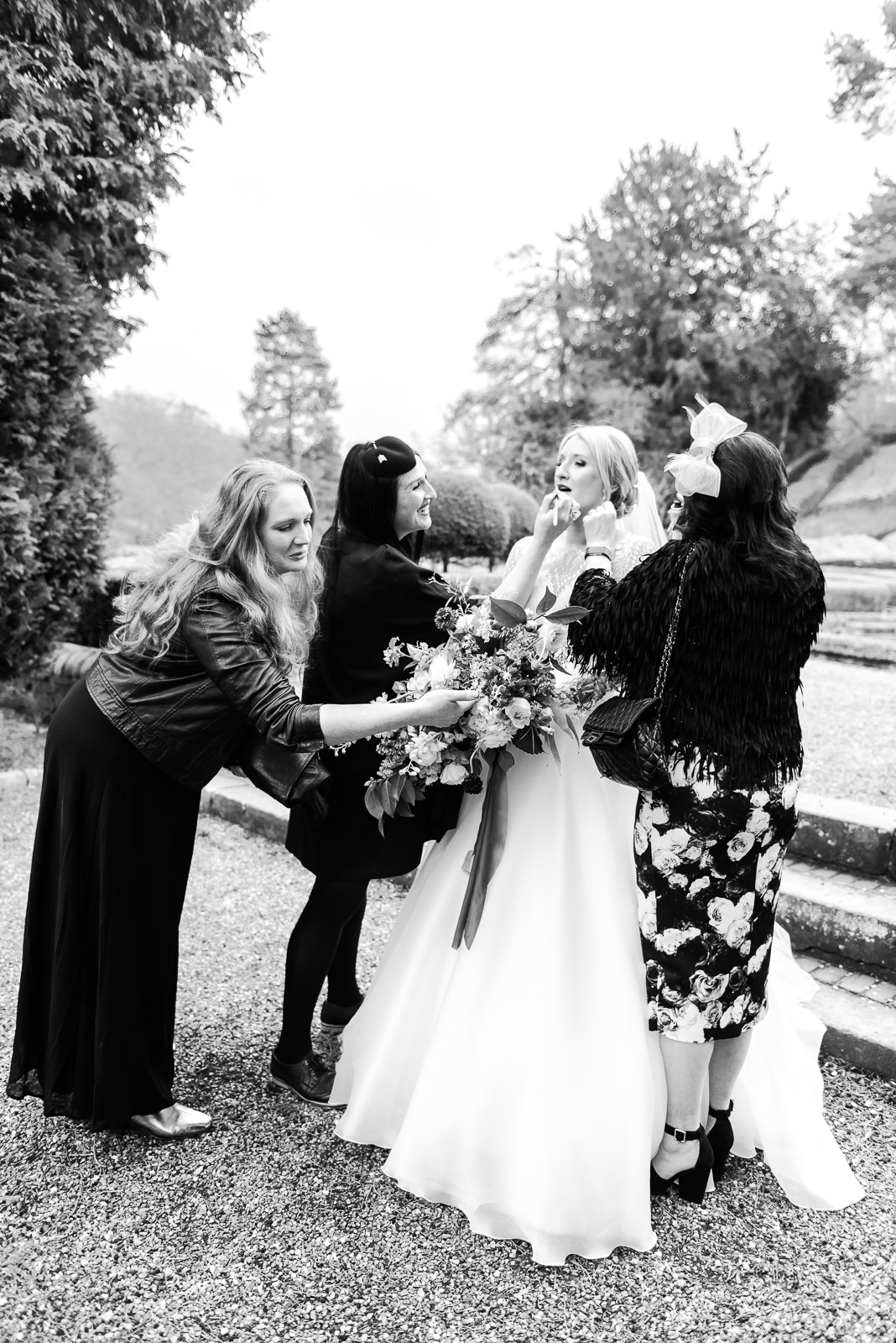Black and white reportage wedding photo of bride