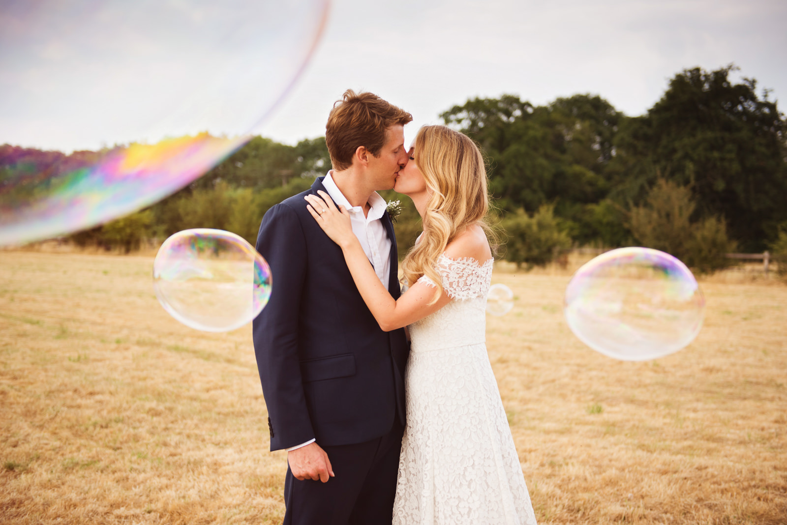 Giant bubbles with bride and groom