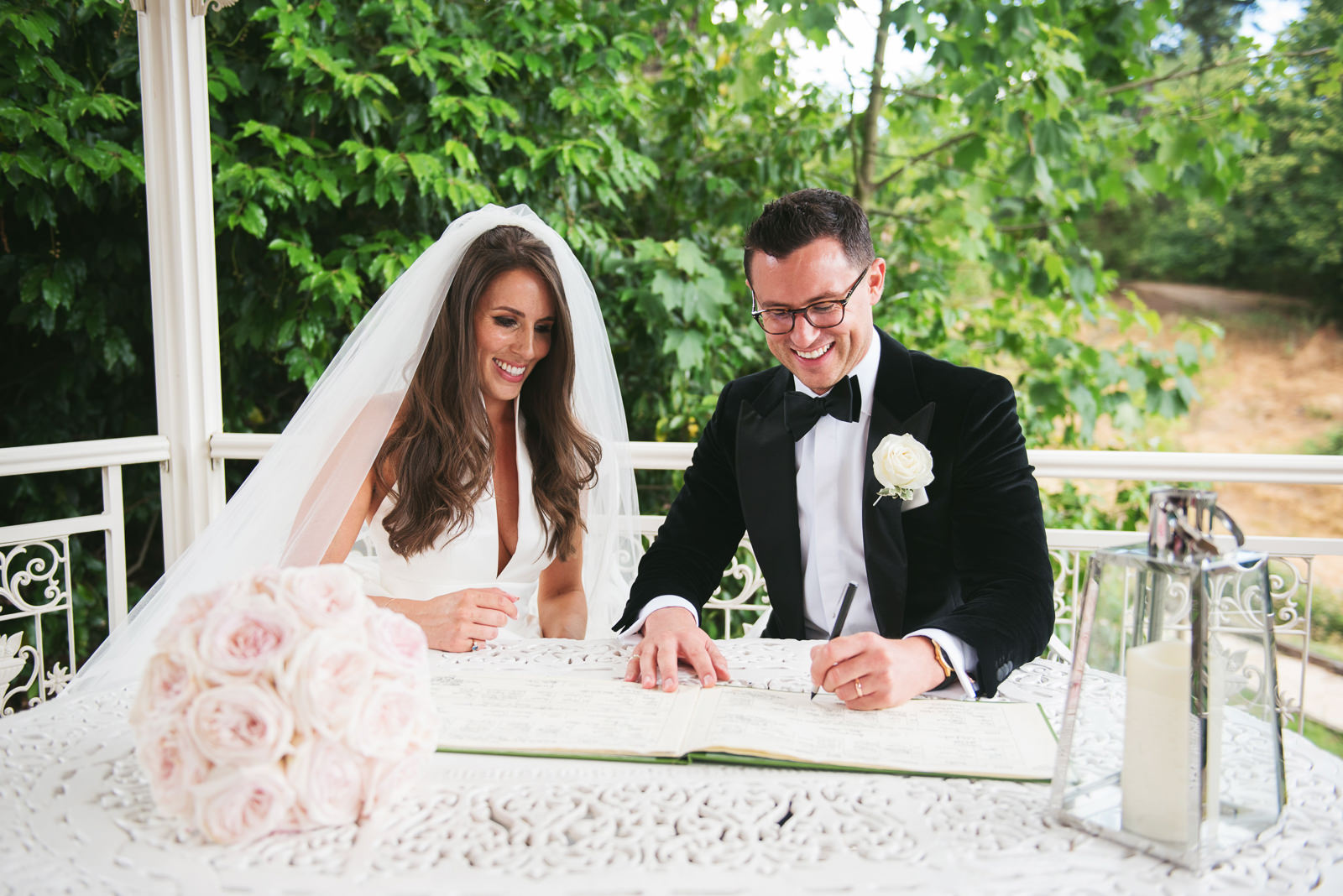 Signing the register at an outdoor ceremony