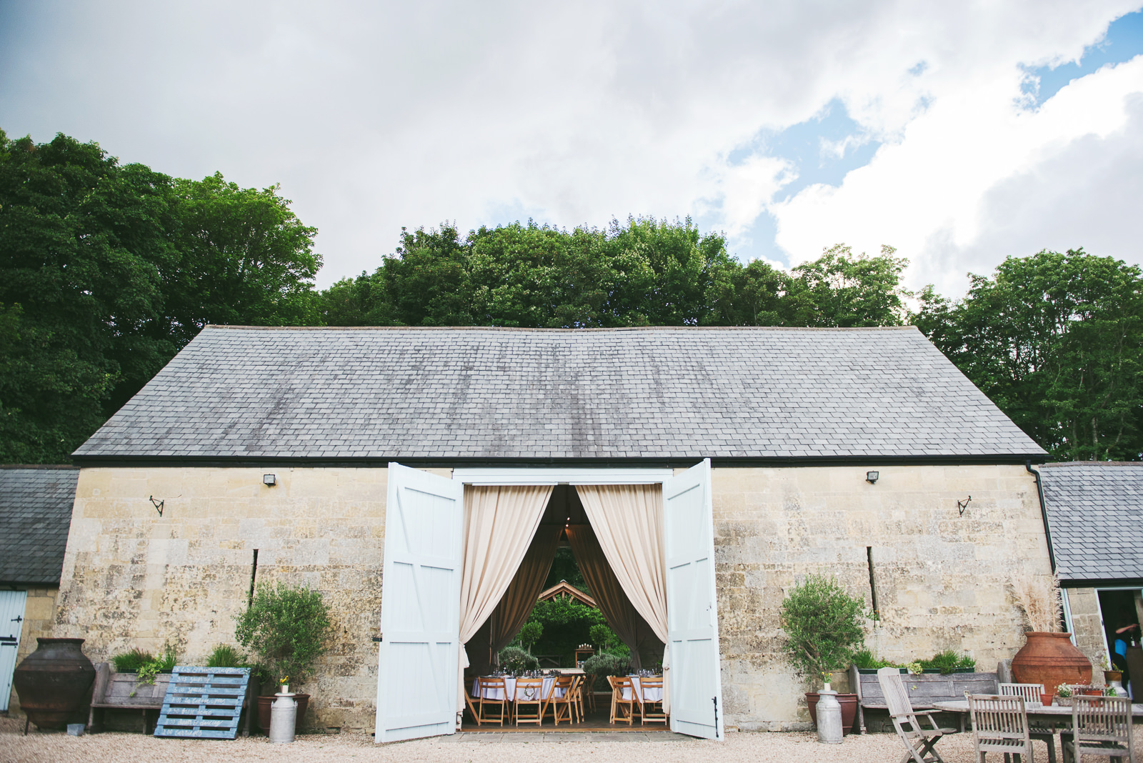 Ashley Wood farm barn set for a relaxed wedding reception.
