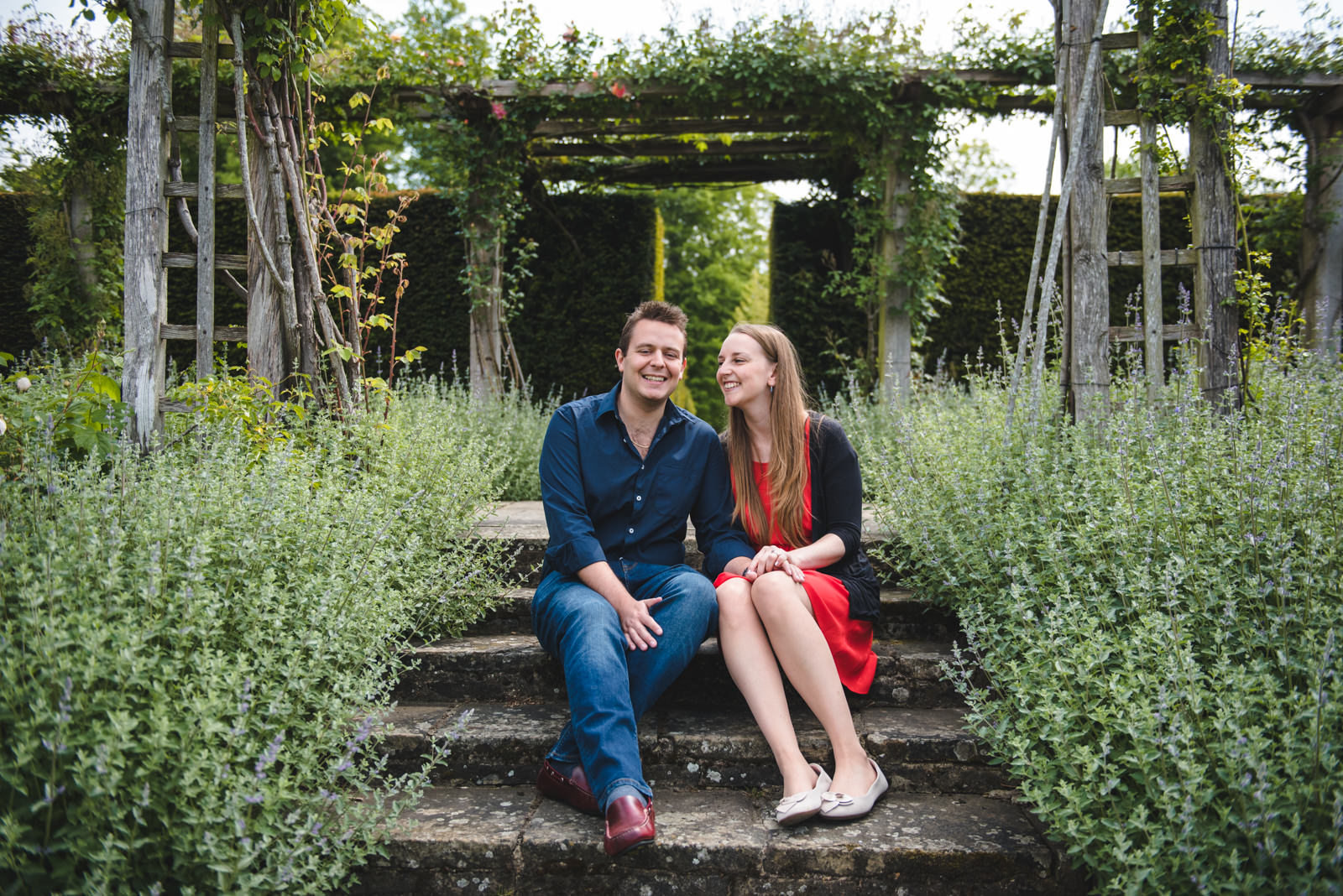Early Summer engagement photos in the gardens at Great Fosters.