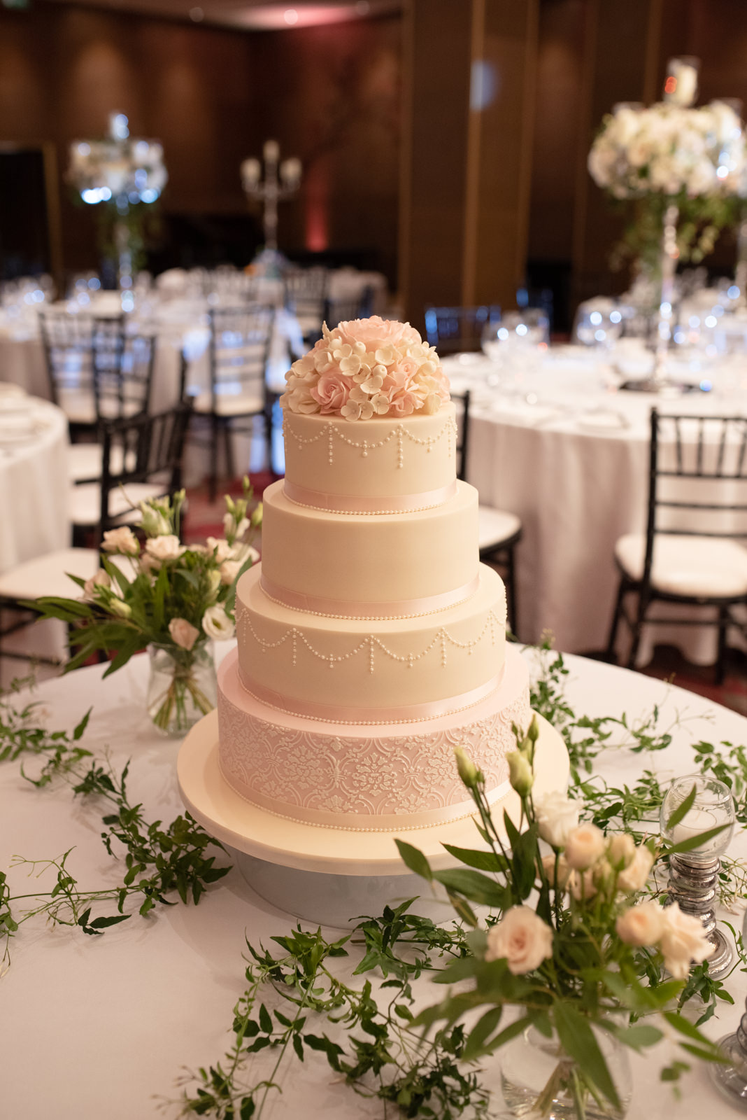 CG Couture pink tired wedding cake.