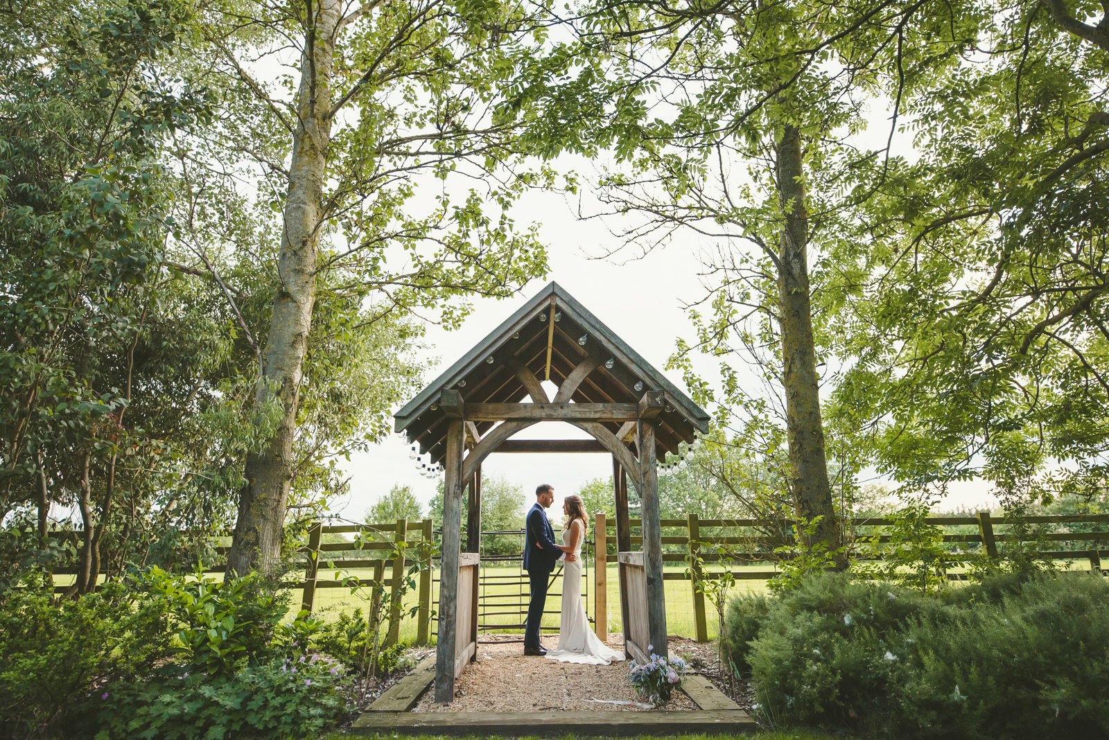 Beautiful bride and groom portraits at a countryside wedding.
