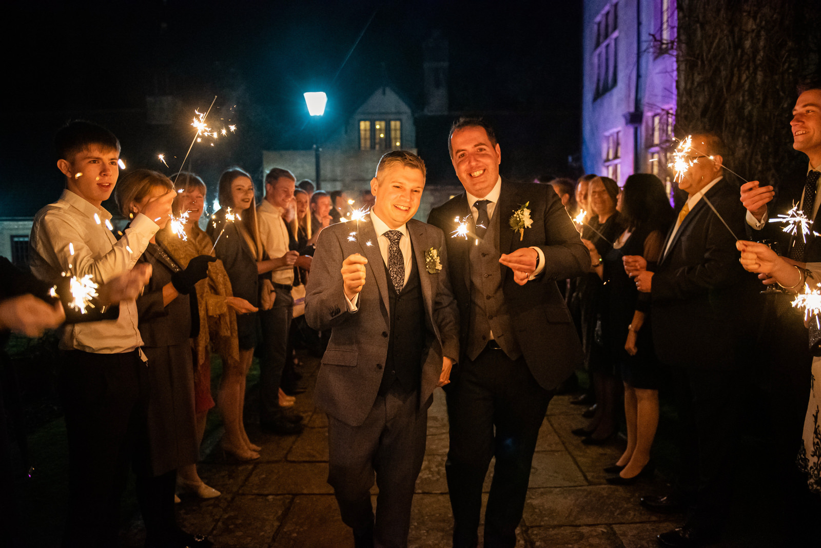 Fun sparkler shots for a same sex winter wedding at Pennyhill Park in Surrey.