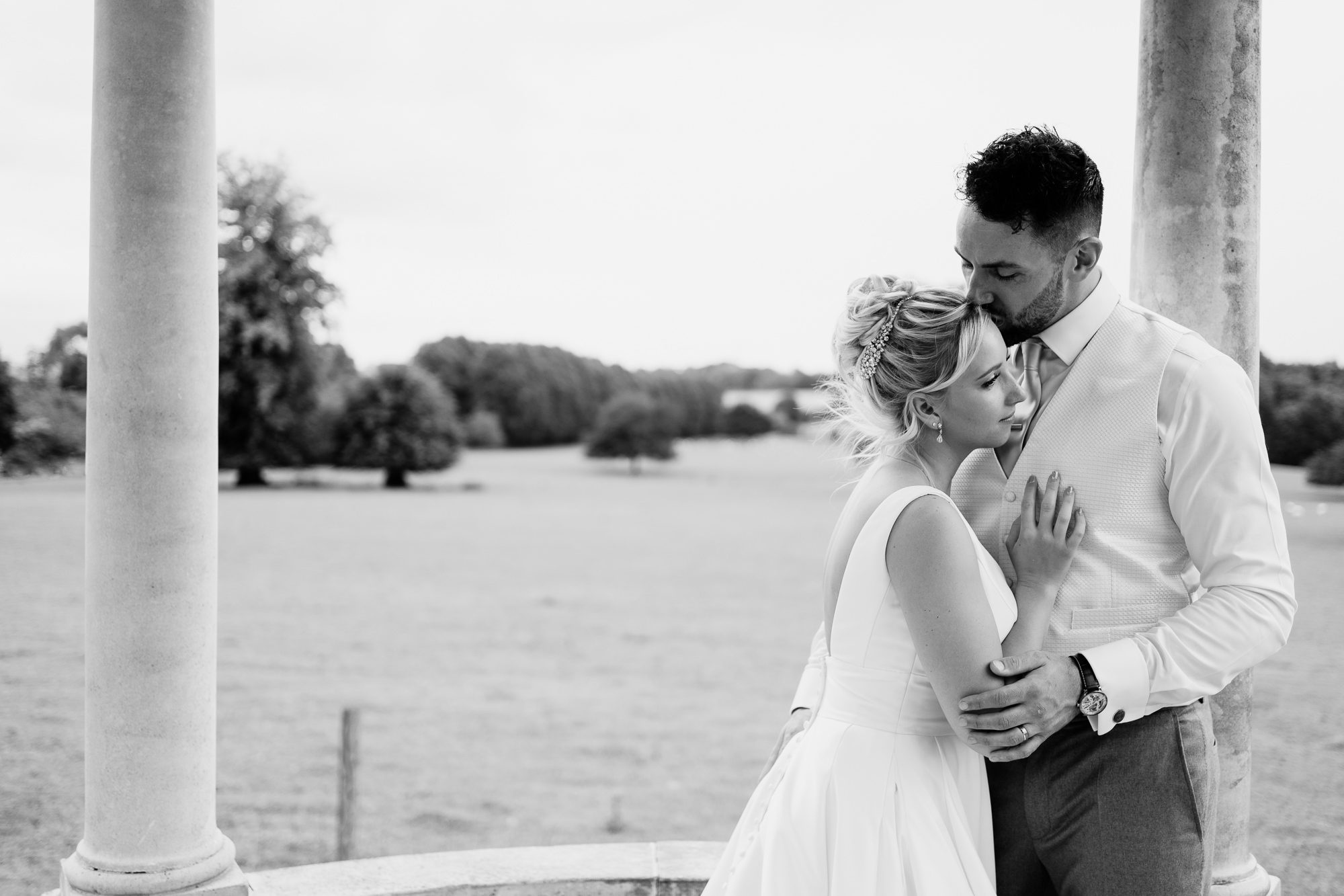Black and white bride and groom portraits at Froyle Park Country Estate.