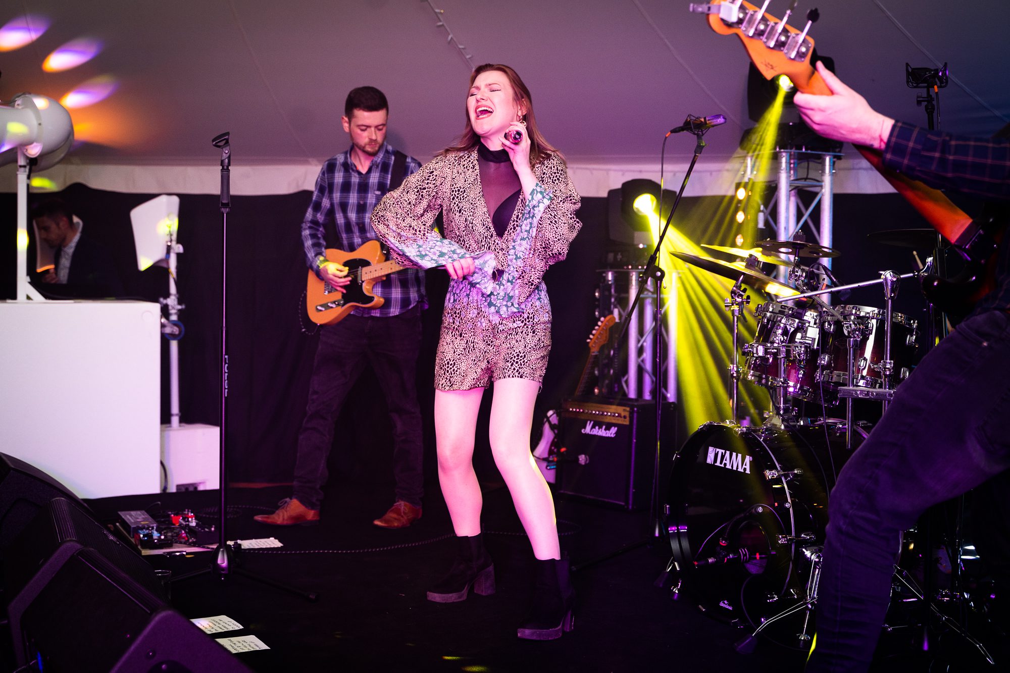 Emma And The Idles perform at a wedding party.