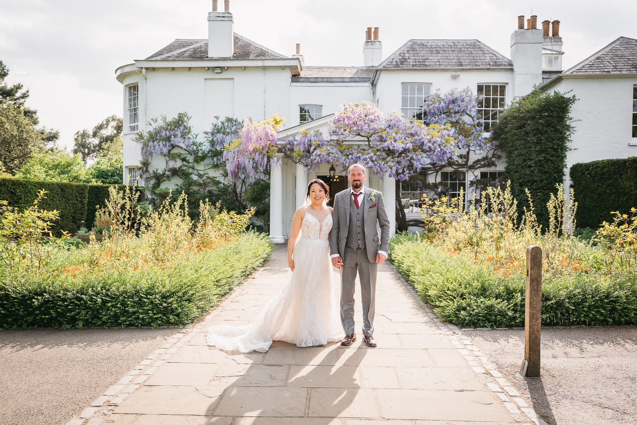 Pembroke Lodge wedding photography during May when the Wisteria is in full bloom.