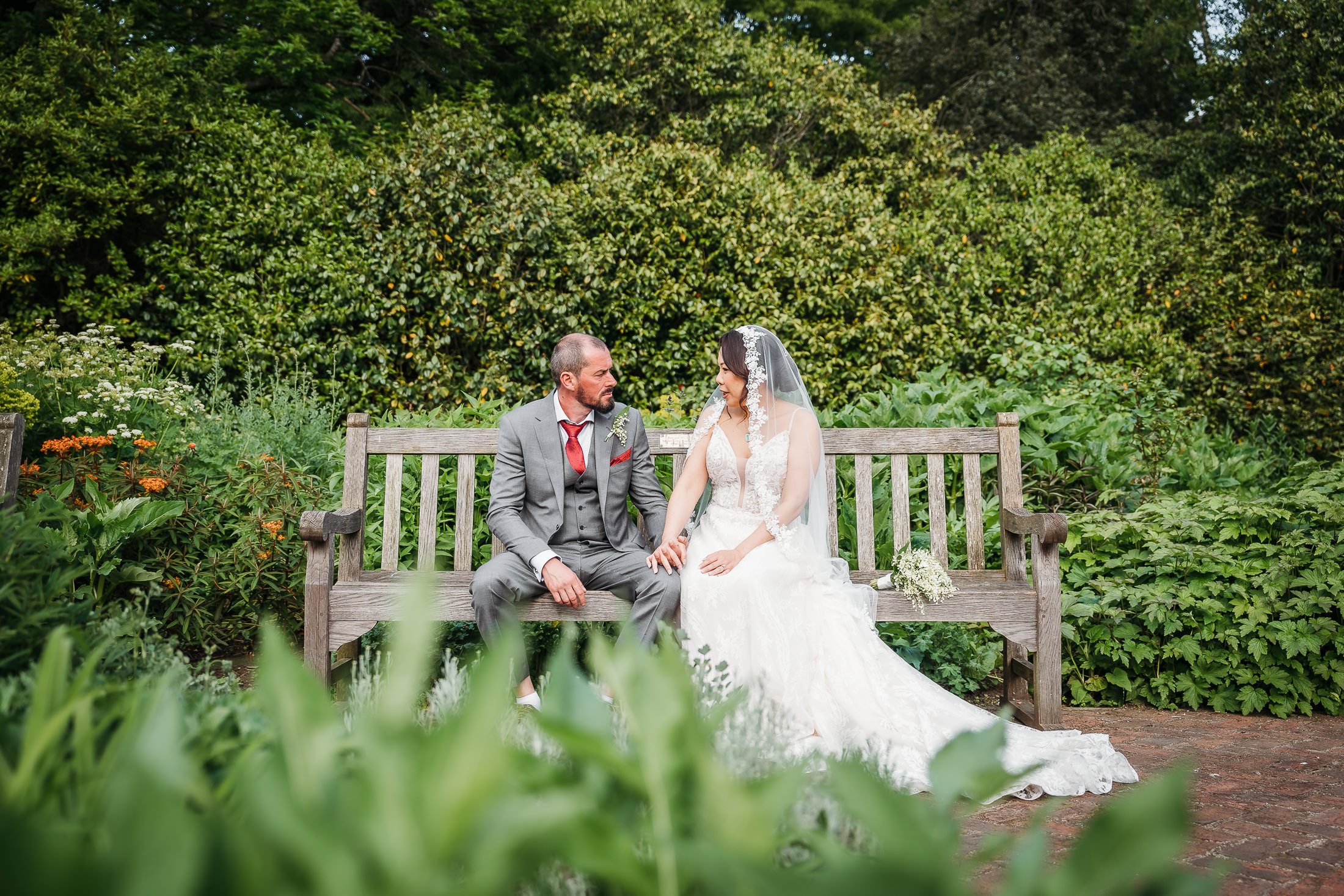 Natural bride and groom portraits in the Rose Garden at Pembroke Lodge.