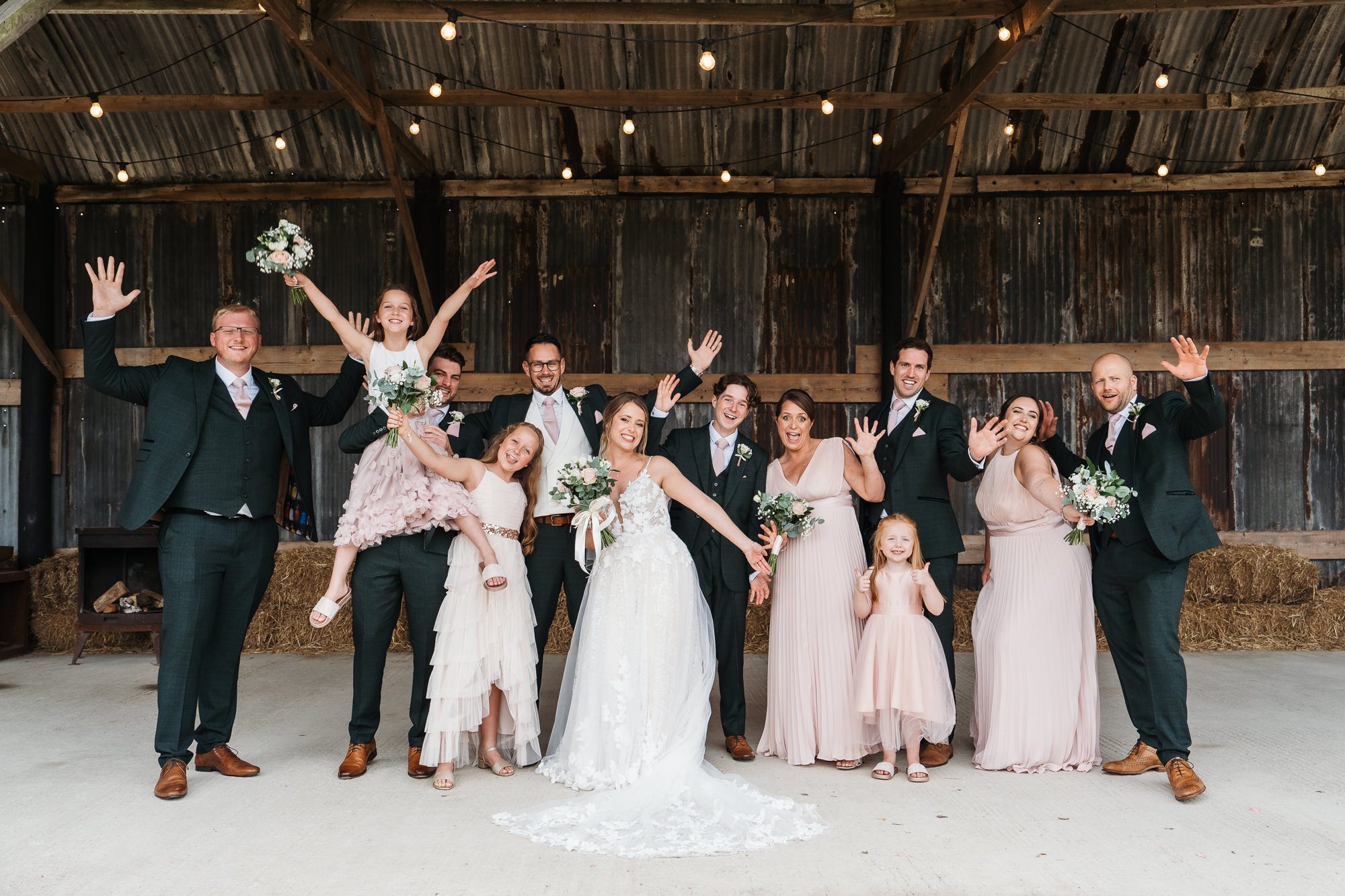 Relaxed and fun wedding group shot ideas with different ages.